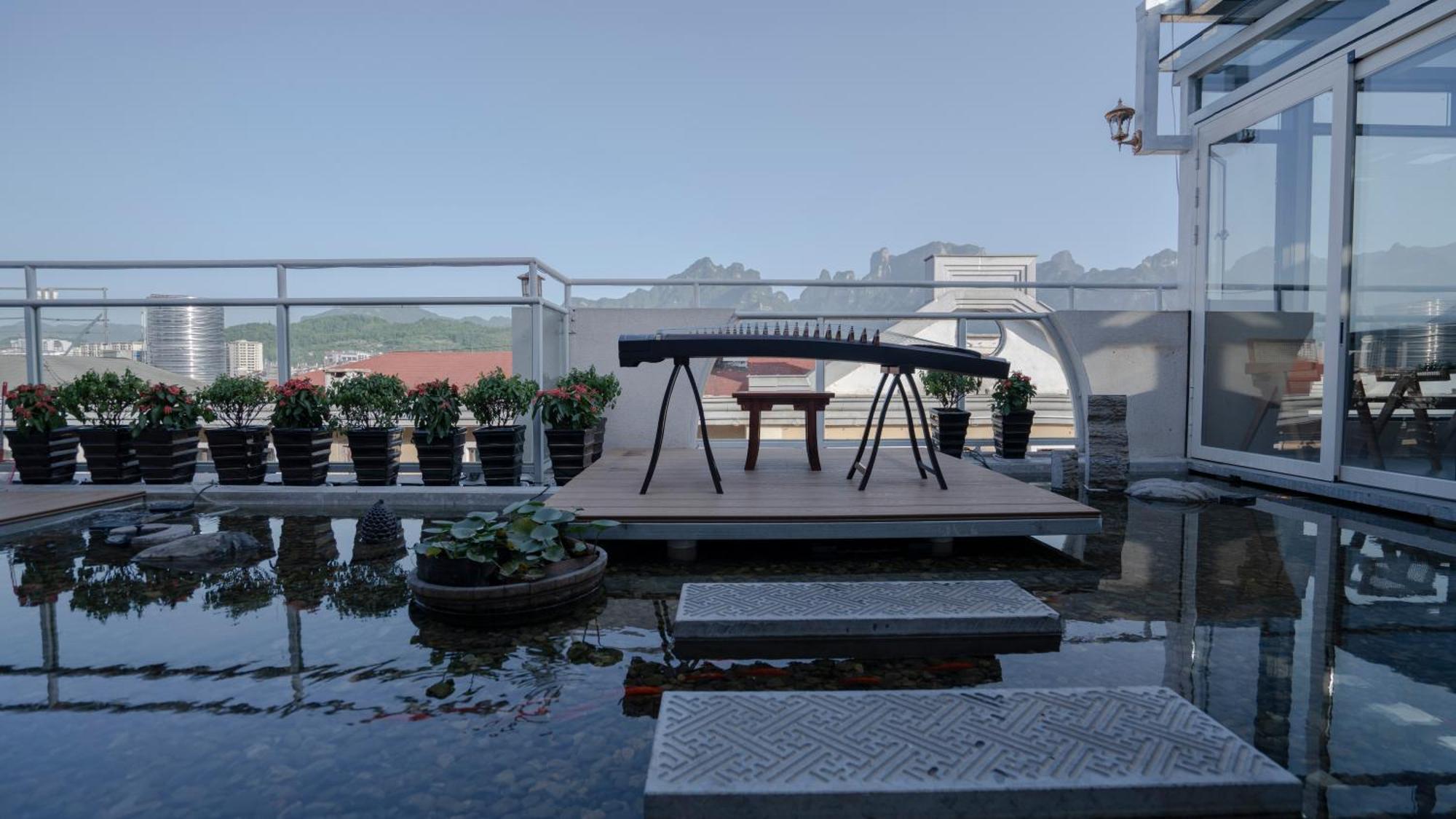 Patio Spring Holiday Inn -- Free Round Trip Pick-Up Service --Panoramic View Of Tianmen Mount زانغجياجي المظهر الخارجي الصورة