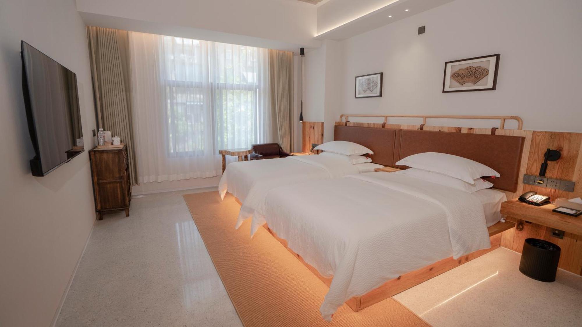Patio Spring Holiday Inn -- Free Round Trip Pick-Up Service --Panoramic View Of Tianmen Mount زانغجياجي المظهر الخارجي الصورة