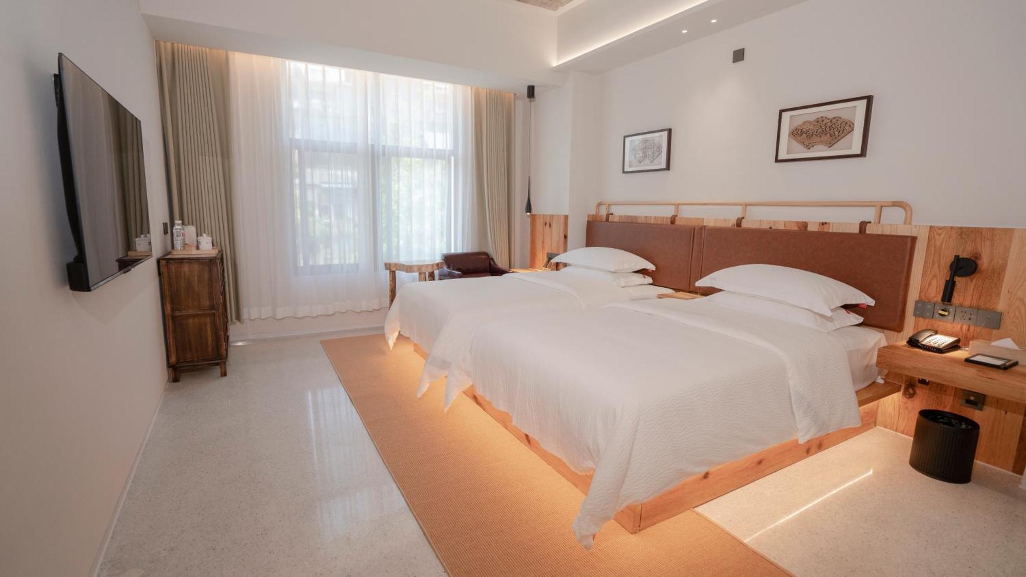 Patio Spring Holiday Inn -- Free Round Trip Pick-Up Service --Panoramic View Of Tianmen Mount زانغجياجي المظهر الخارجي الصورة