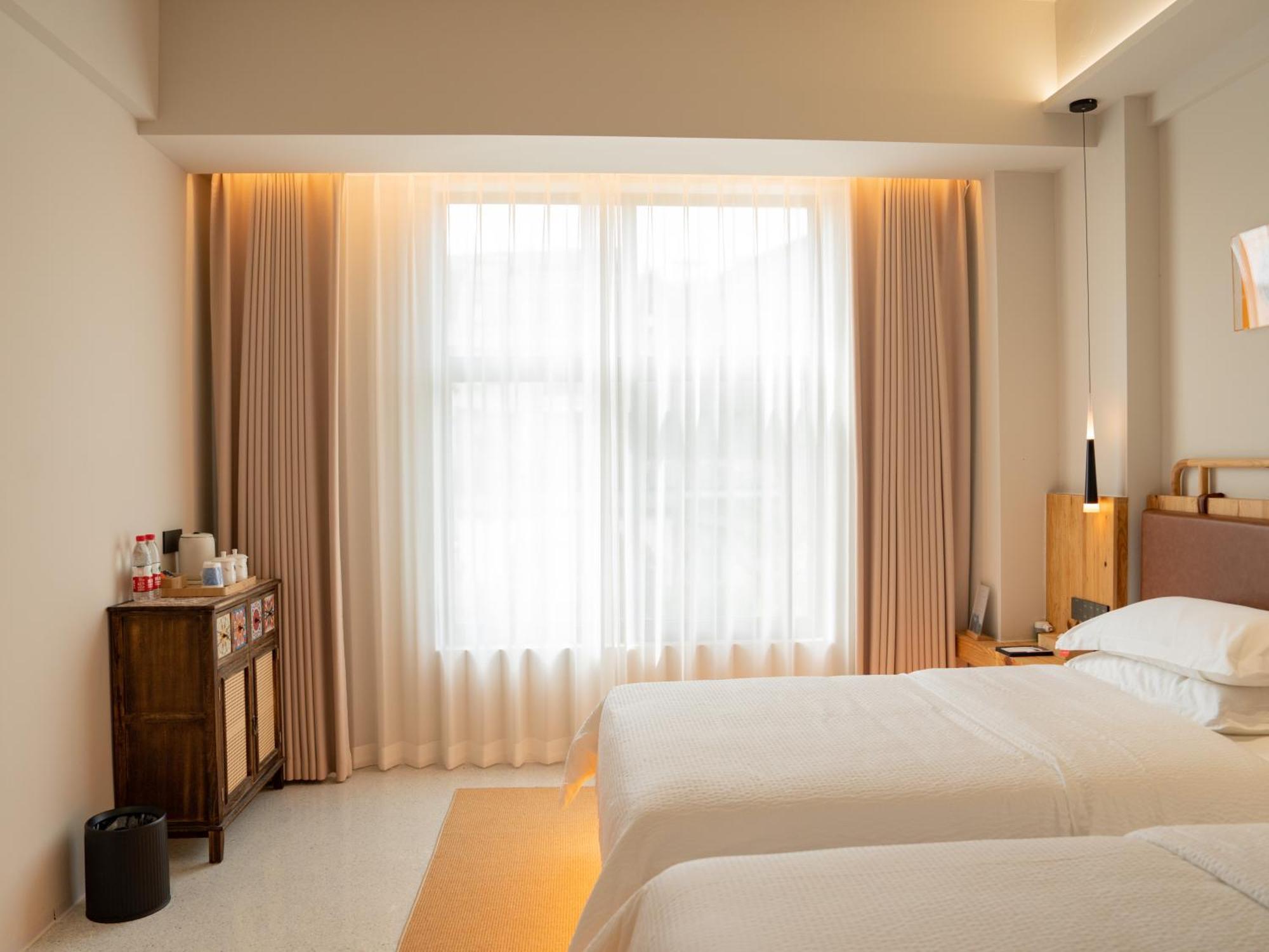 Patio Spring Holiday Inn -- Free Round Trip Pick-Up Service --Panoramic View Of Tianmen Mount زانغجياجي المظهر الخارجي الصورة