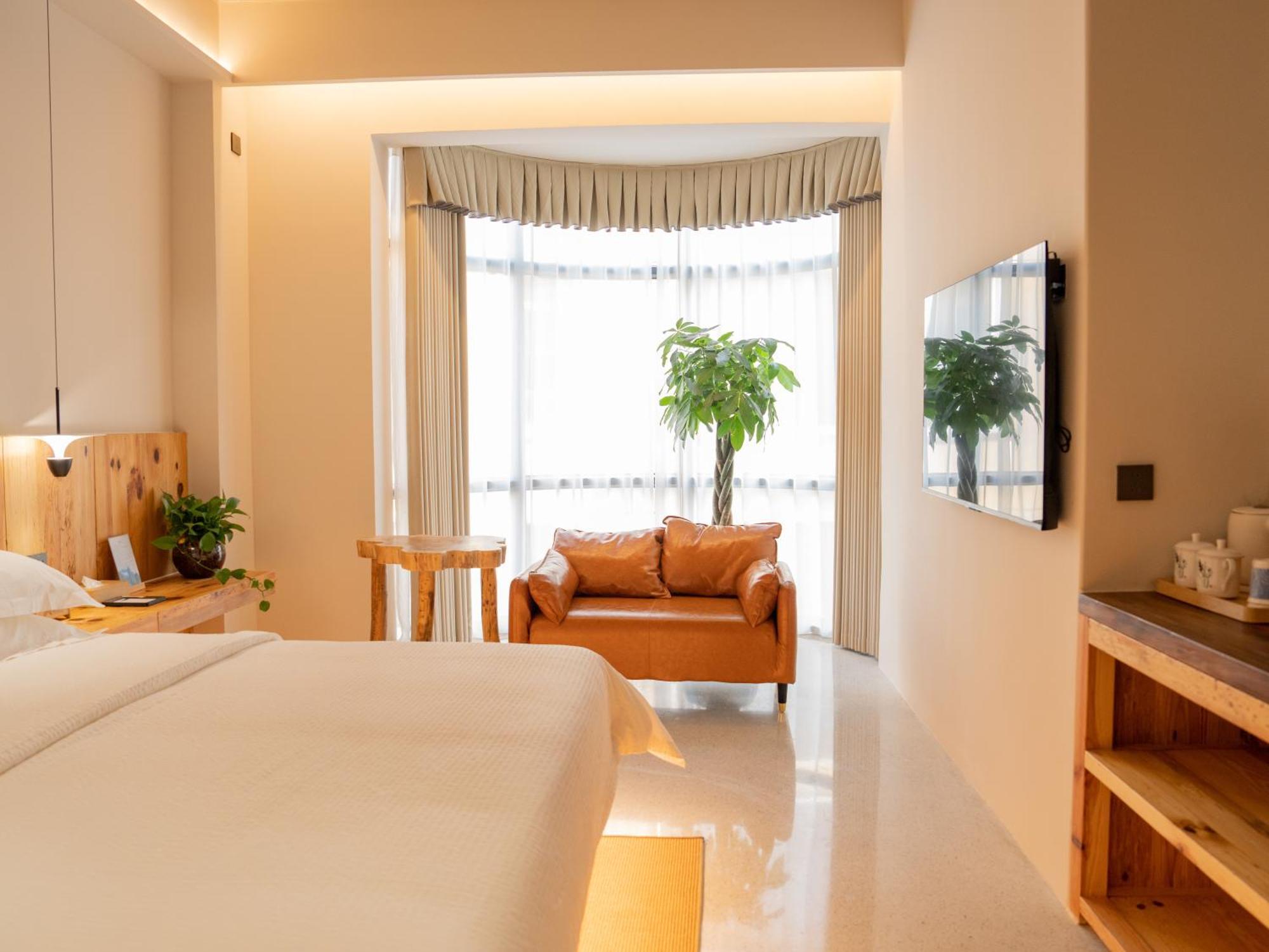 Patio Spring Holiday Inn -- Free Round Trip Pick-Up Service --Panoramic View Of Tianmen Mount زانغجياجي المظهر الخارجي الصورة